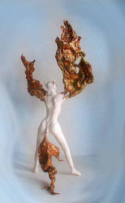 a coyote-headed shapeshifter from the back, caught as her arms stretch into wings. Sculpture by Wayan. Click to enlarge