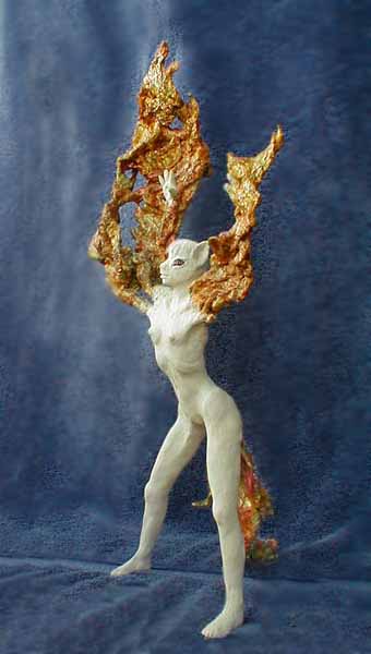 Coyote-girl caught shapeshifting just as her arms stretch into smoky wings. Sculpture by Wayan. Click to enlarge.