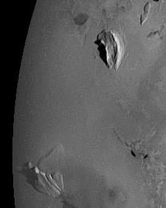 Mt Pillan, left, and the Ionian Mts, right, near Pele on Io.