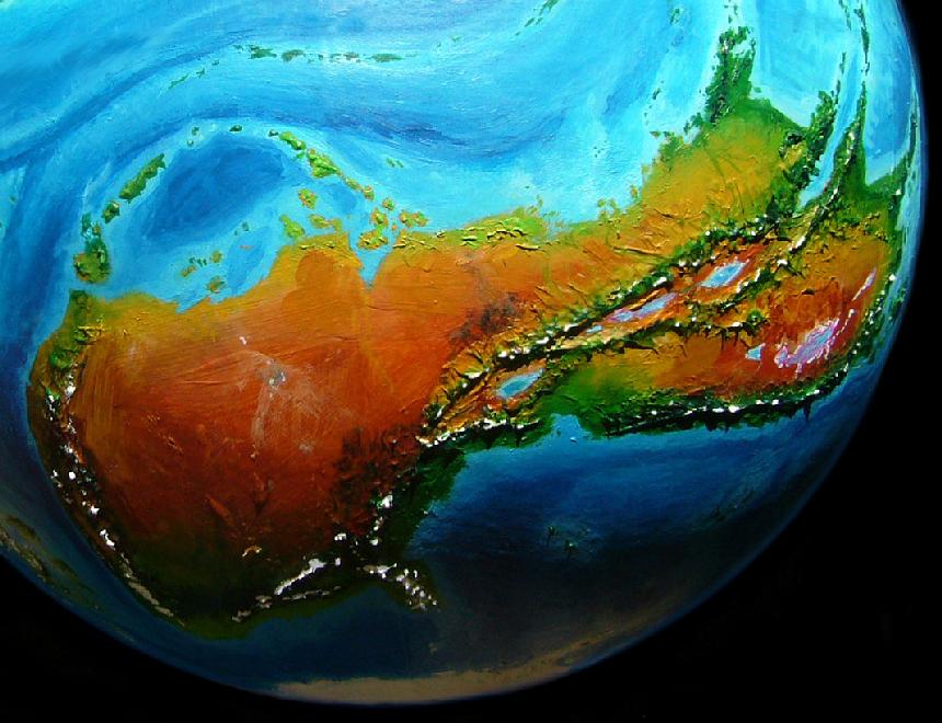 High orbital photo of Ata, a huge two-lobed east-west dry continent on Kakalea, a model of an Earthlike world full of Australias.