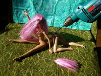 The sculpting of Fuchsia, a centauroid dancer, out of two Barbies; by Chris Wayan. Click to enlarge