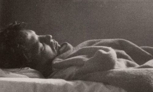 writer Jack Kerouac sleeping, 1958; photo by Robert Frank