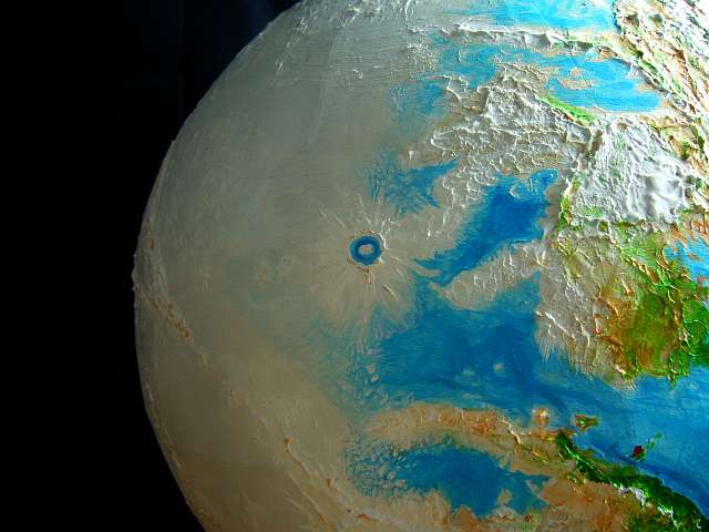 Orbital photo of Dawnring Crater on the equatorial nightside of Libratia, a tidelocked world.