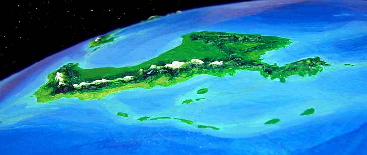 Low orbital photo looking southeast at Starkad, a long mountainous island on Lyr, a model of a huge sea-world. Click to enlarge.