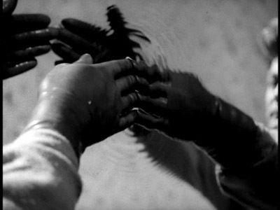 Mirror scene from 'Orpheus', a film by Jean Cocteau.